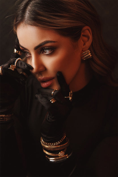 Titan Crest Curved Earring