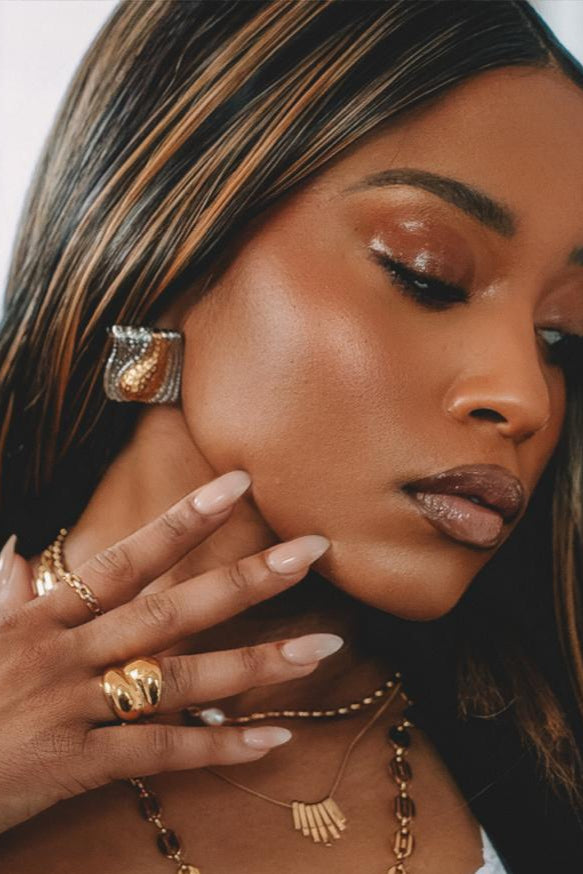 The Gold drop wavy crest earrings