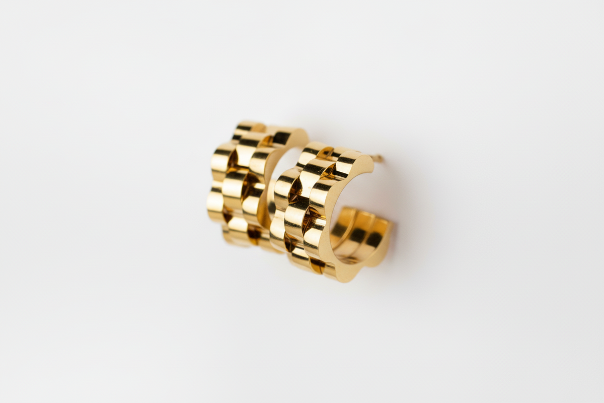 Titan Crest curved earrings