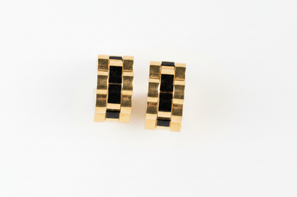 Titan Crest curved earrings