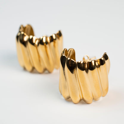 Titan Crest Curved Earring